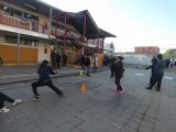 Estudiantes viven competencias de juegos típicos en el patio central del TDG Lo Prado